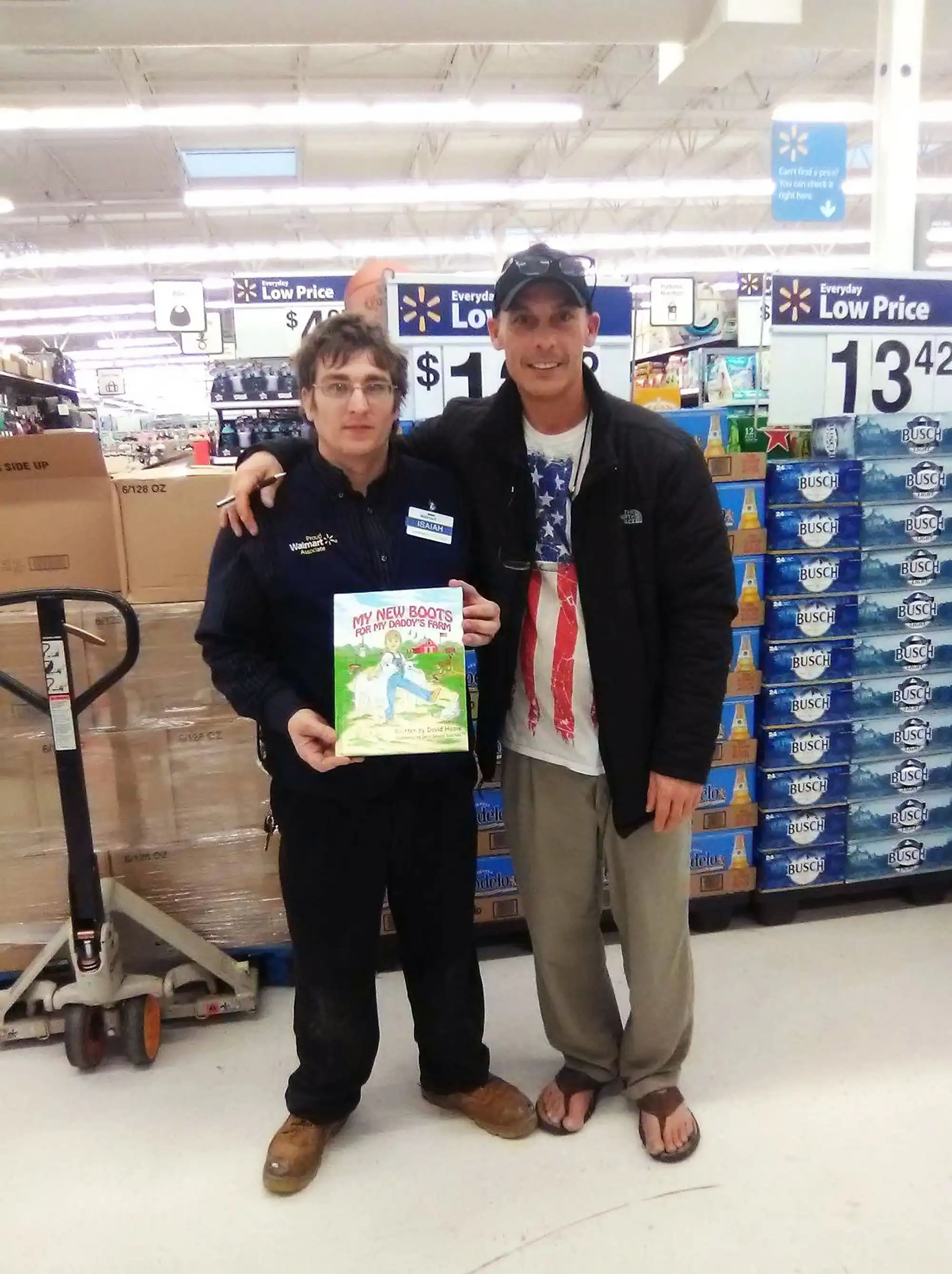 Author David Haave inspiring Walmart employee to keep striving forward in writing and college.